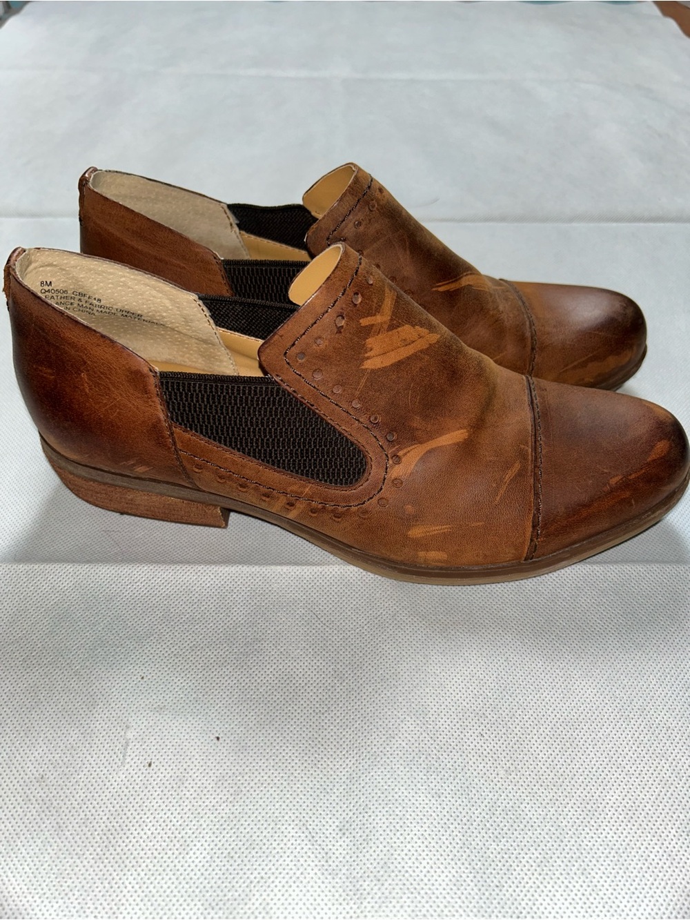 Korks brown leather slip on ankle booties size 8